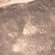 Illustration for article titled Who created these huge, mysterious wheel patterns in the Mideast thousands of years ago?